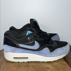 Nike Air Max Black and Blue Sneakers with Iconic Swoosh